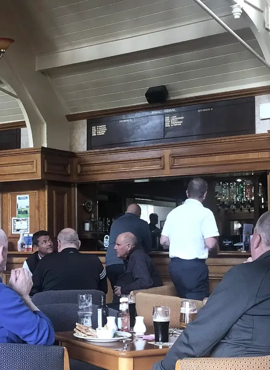 Golf club members in the main clubhouse lounge